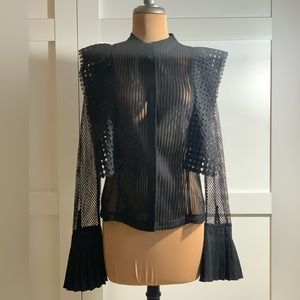 Black lace blouse with paneling and pleated cuffs by Gracia